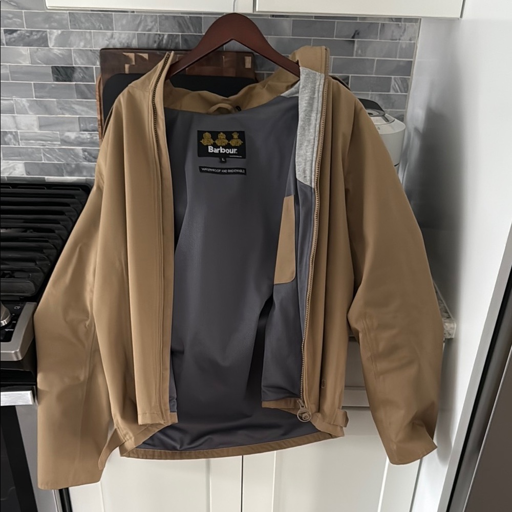 Barbour Men's Tan Rain jacket with removable hood.